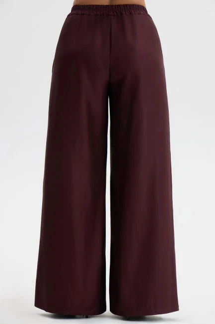 Брюки палаццо из костюмной ткани с блеском – фото – Plus Size 50–64 – Моно-Стиль
