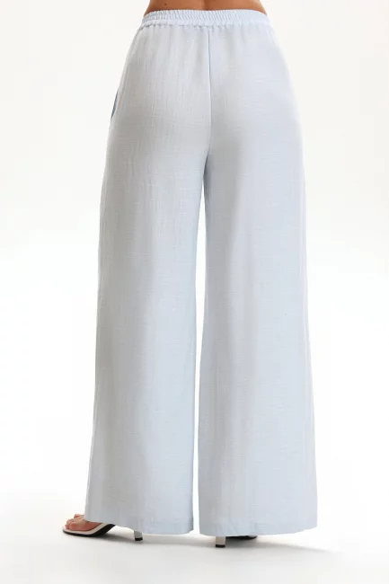 Брюки палаццо из голубого льна
