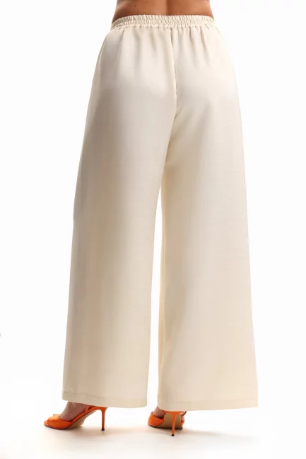 Брюки палаццо из ткани с золотым напылением