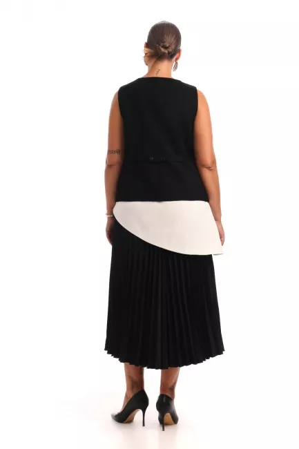 Юбка баска с асимметричным низом