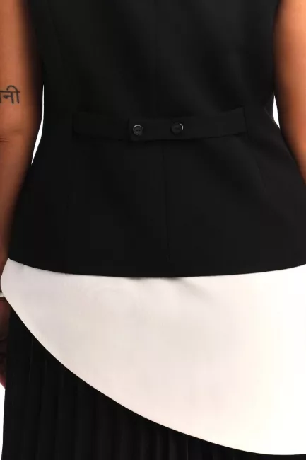 Юбка баска с асимметричным низом