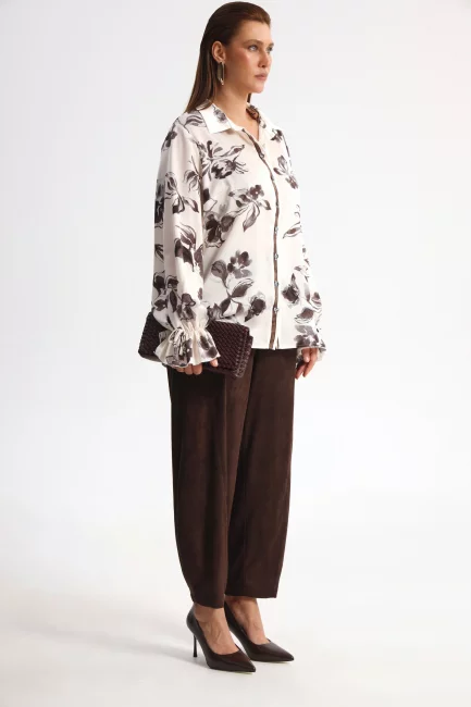 Блузка из поливискозы с черным принтом