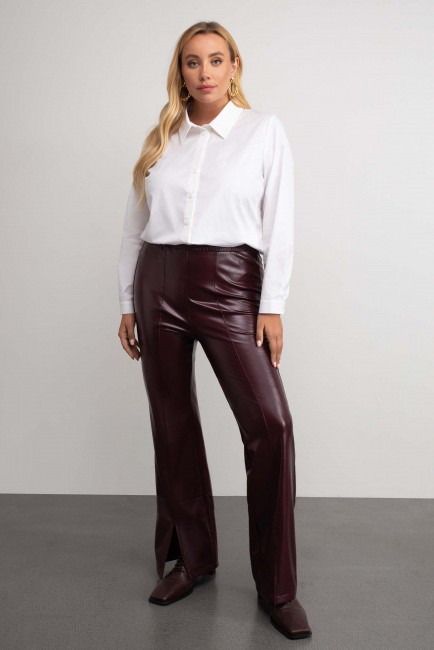 Кожаные брюки с разрезом в оттенке бордо на замшевой основе стильные женские 