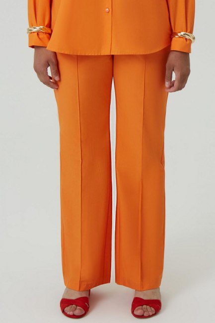 Оранжевые брюки клеш из смесового хлопка